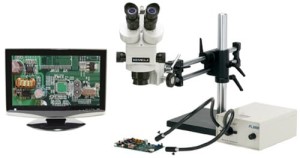 Meiji Trinocular-Zoom Microscope System; Standard Range 3.5 - 45X; 10X Eye Pieces; 5MP Hybrid HDMI/USB Camera; 22" LED Screen; 150w Fiberoptic Dual Point Light