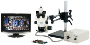 ProZoom  6.5 Trinocular Microscope; Super-Wide (28mm) 10X Eyepieces; ESD Safe Standard; Standard Range 5-65x (up to 390X with optional parts); .3x CCD Adapter; 5MP Ultra-Cam  II Hybrid HDMI/USB Digital Camera with Advanced Imaging & Measurement Software Suite and 22" LCD Monitor; AIMS includes on-screen controls via wireless mouse for Image/Video Capture\\\, Live vs. Frozen Image comparison\\\, Calibrated Measurement\\\, Labeling\\\, Digital Noise Reduction\\\, Export to Excel\\\, and more; Now included FREE ($595 Value) Exclusive PC suite software extension combines all features listed above\\\, along with Extended Depth of Field Stacking\\\, Image Stiching\\\, and more (PC needed);  6 Diopter Adjustable eyepieces to correct individual eyesight variations; Greater working distance\\\, Magnification range\\\, and Field of View than a traditional microscope; 150w Fiberoptic Annular Light (Micro-Lite  FL3000-A)